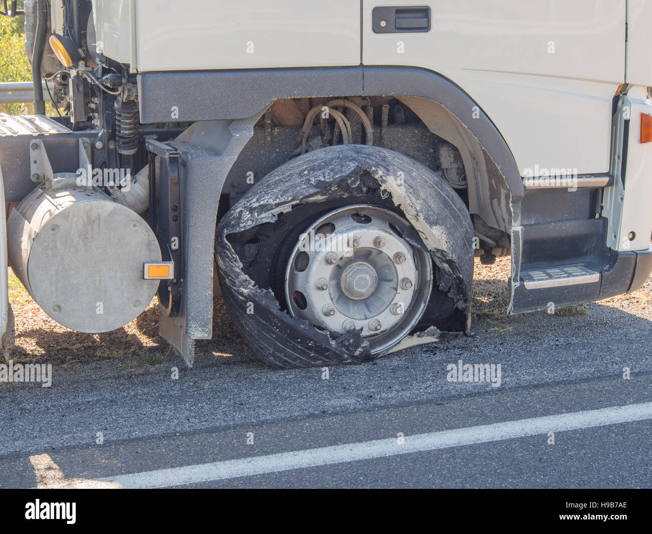 Blown truck tire after tire explosion at high speed Stock Photo