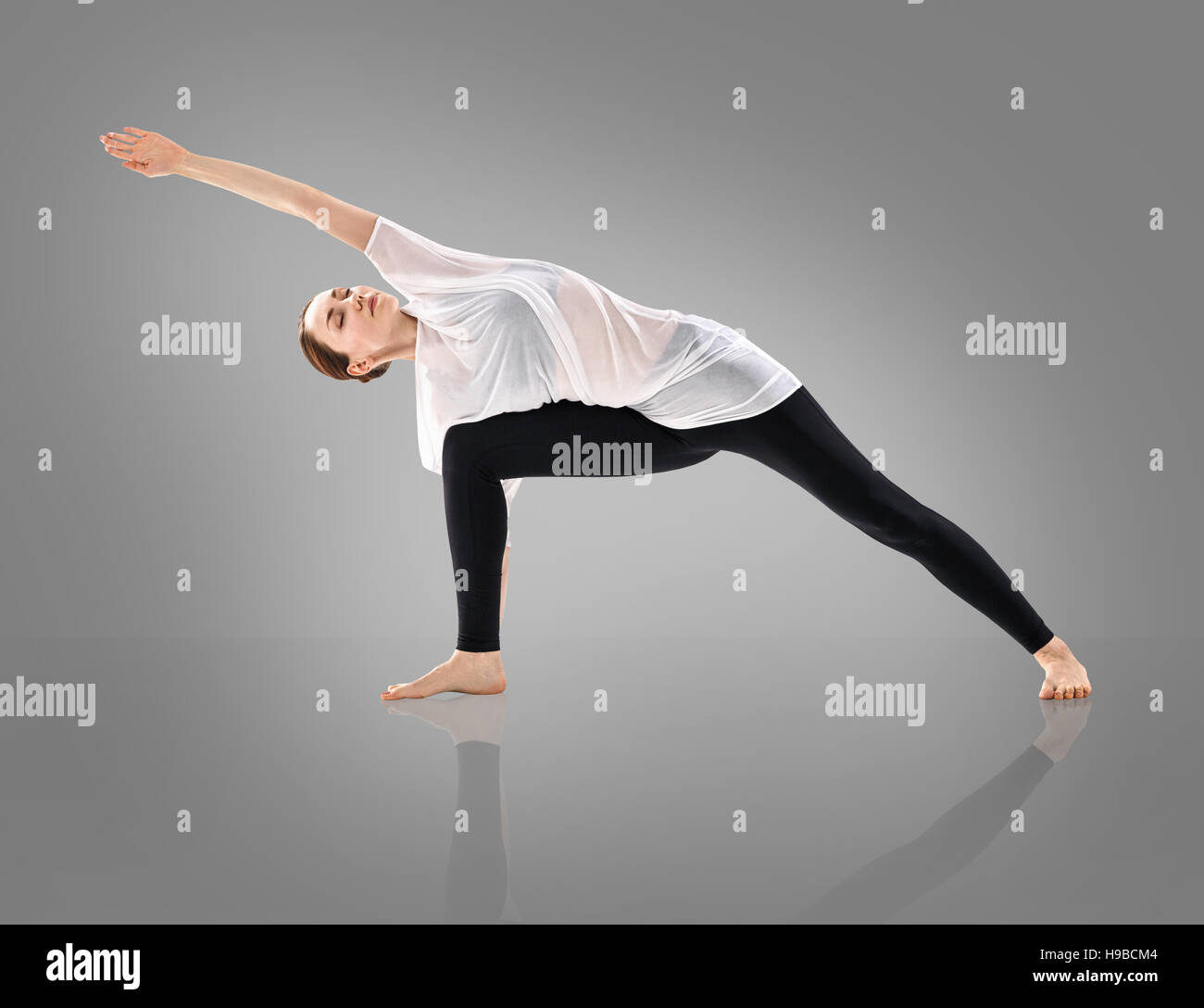 Young Attractive Woman Practicing Yoga Standing Stock Photo 1305040945
