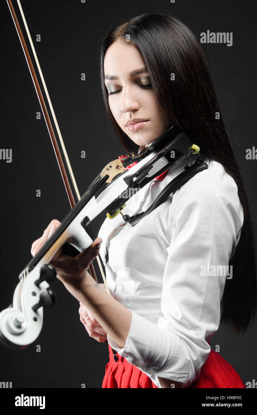 girl violin black background, playing Stock Photo - Alamy