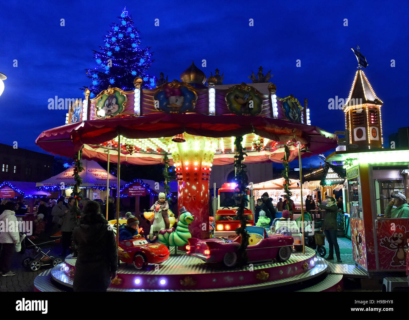 Christmas market visitors and carousel hi-res stock photography and ...