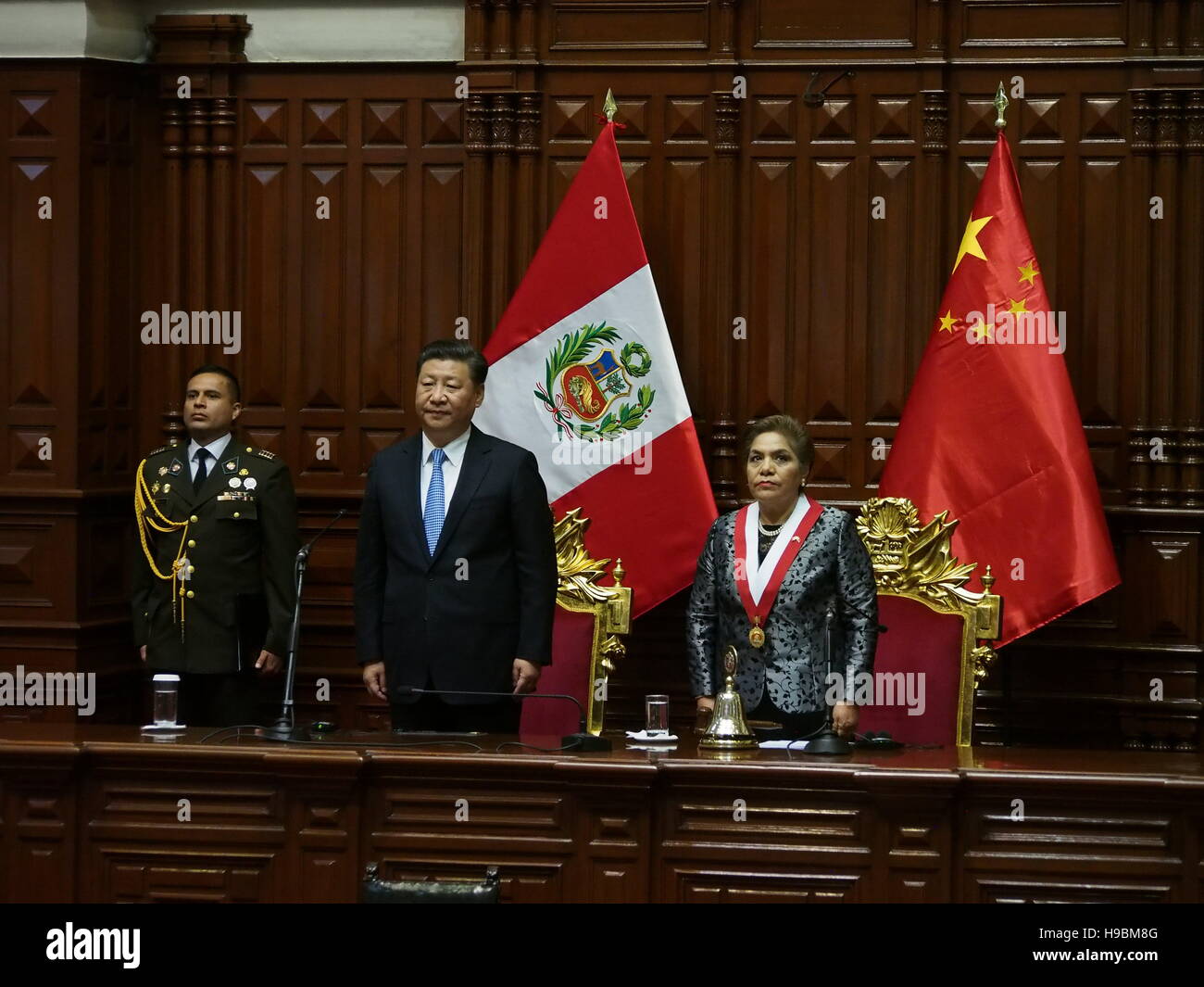 The President of the People's Republic of China, Xi Jinping, and Luz Salgado, president of the Peruvian Congress, in a solemn session in the hemicycle. Xi Jinping received the Medal of Honor of the Congress of the Republic of Peru, on the Grand Cross Degree, during the State visit to the XXXIV Summit of Leaders of the Asia Pacific Economic Forum (APEC 2016). © Fotoholica Press Agency/Alamy Live News Stock Photo