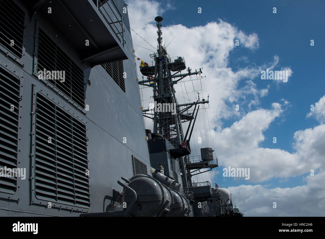 Part of the deck with radar tower on a modern warship Stock Photo