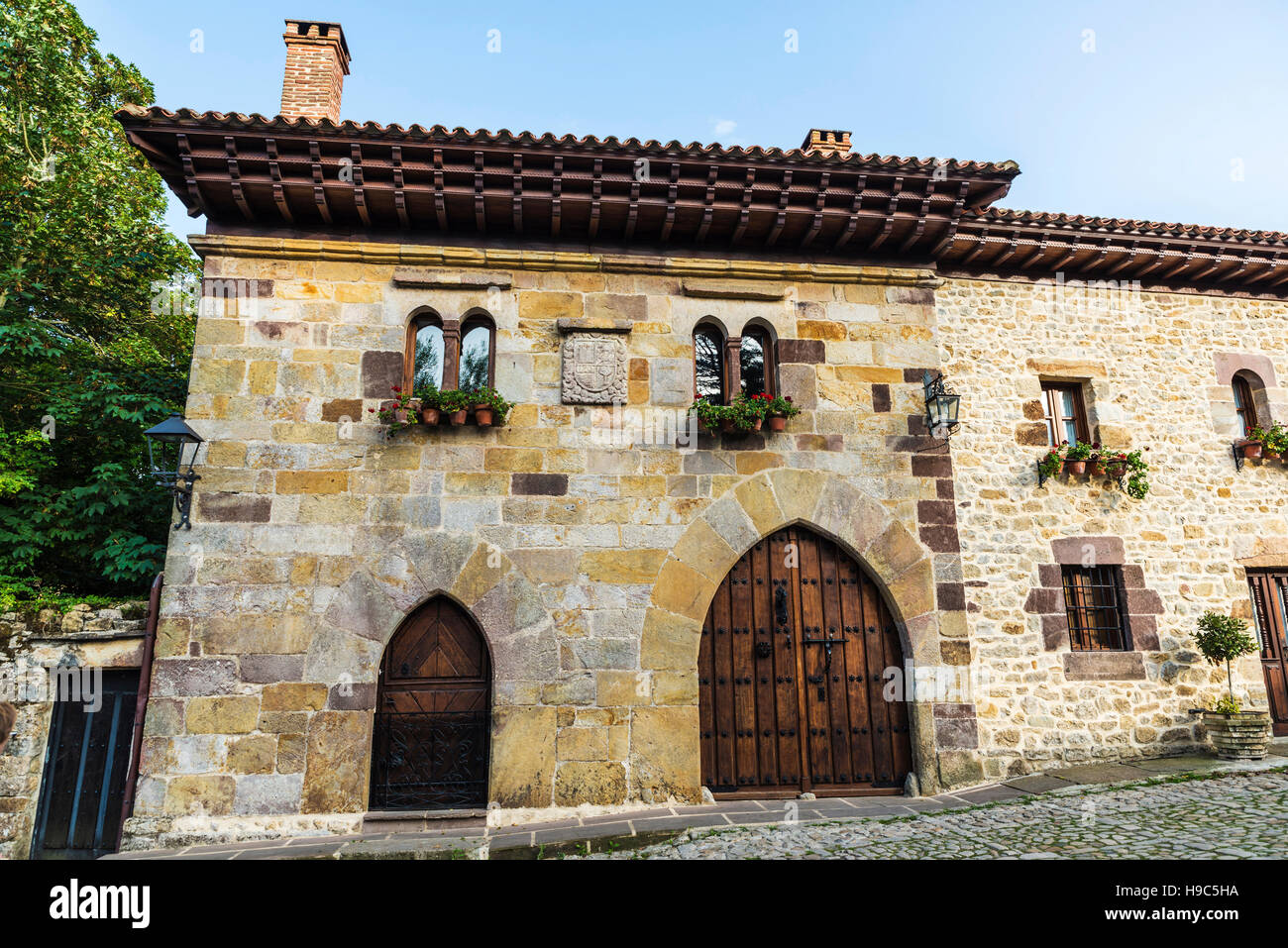 Facade of an old historic building of the medieval village of