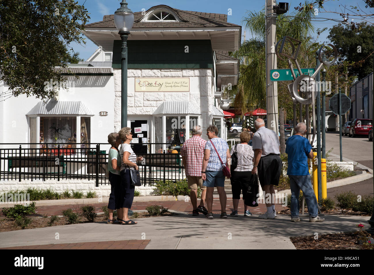 Mount Dora Florida USA - Visitors to the town center crossing the street Stock Photo