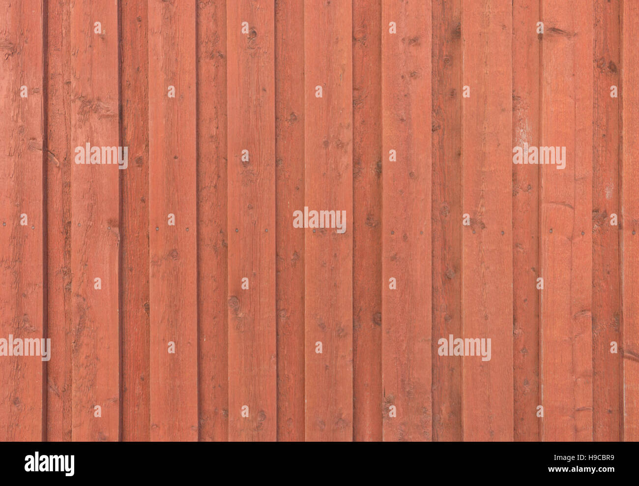 Scandinavian wood texture in Falun-red - texture - background (historic old town of Porvoo, Finland). Stock Photo