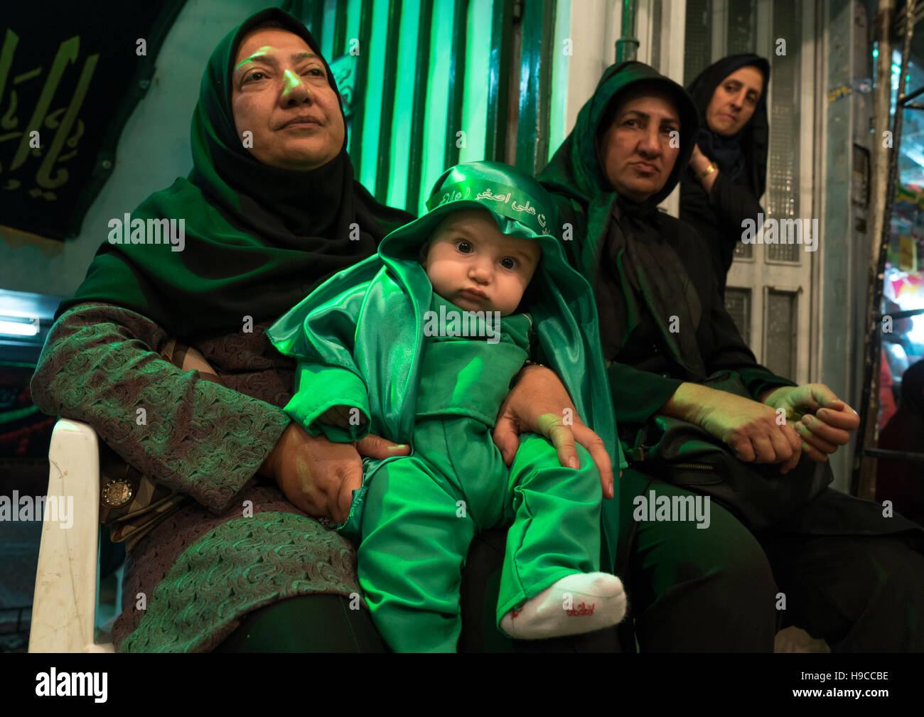 Iranian shiite muslim mother and her son dressed for muharram celebration, Central county, Theran, Iran Stock Photo