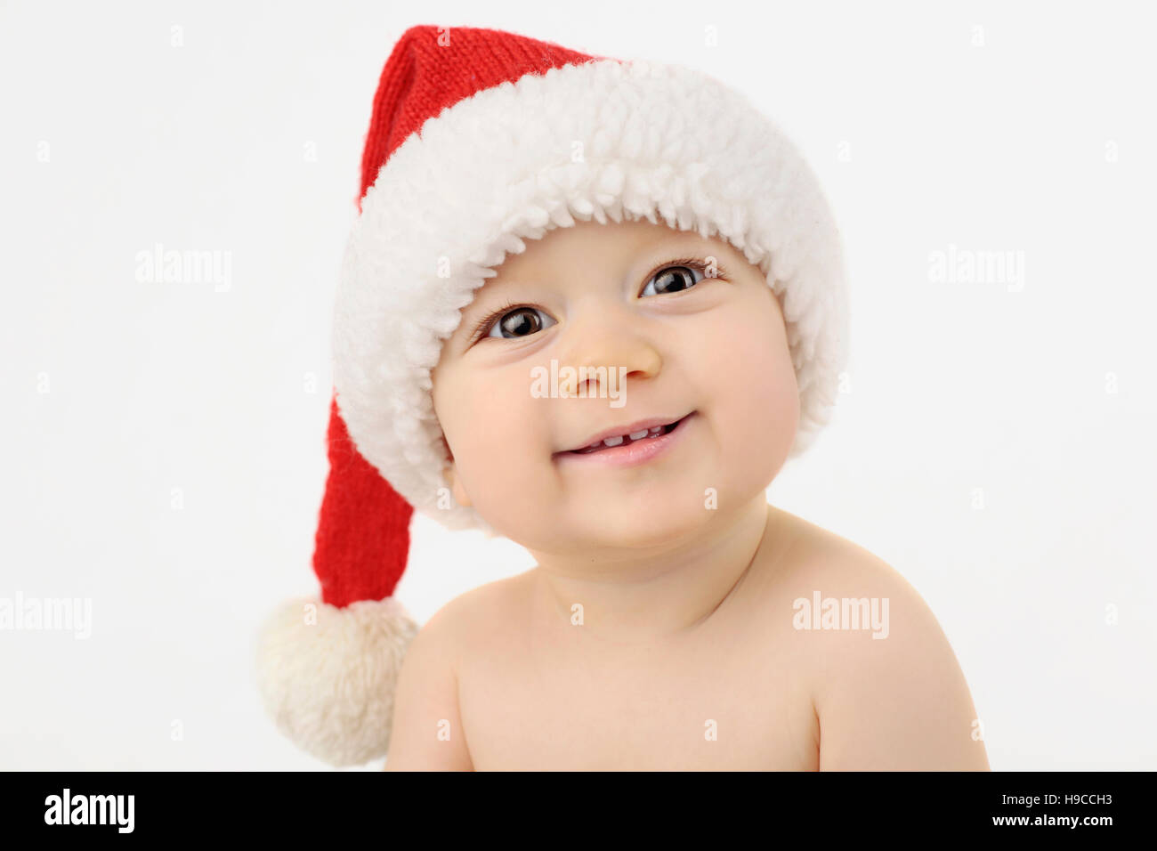 Smiling boy in Santa's hat. Baby santa Stock Photo Alamy