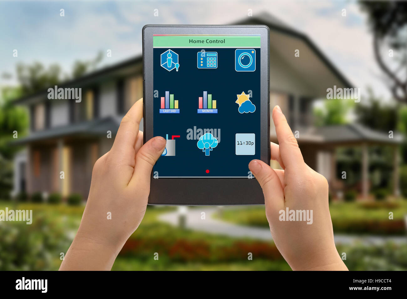 a remote home control system on a digital tablet Stock Photo Alamy