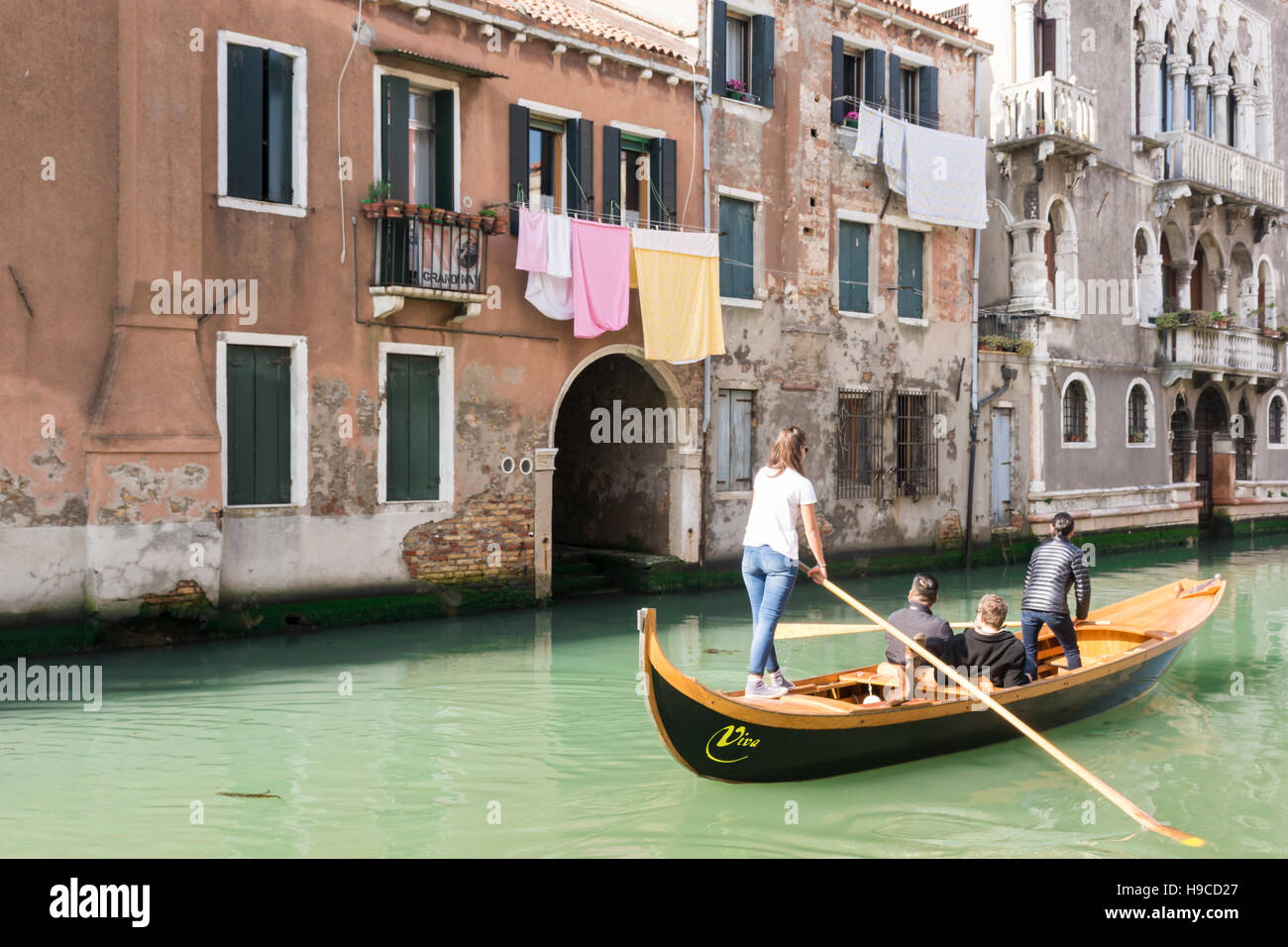 Gondolas in a quiet canal of venice hi-res stock photography and images ...