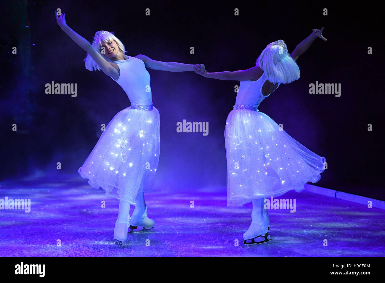 Ice dancers perform the Snowflake dance during a photo call for The