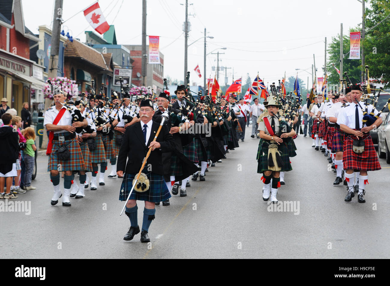 bagpipe band marching in a parade Stock Photo