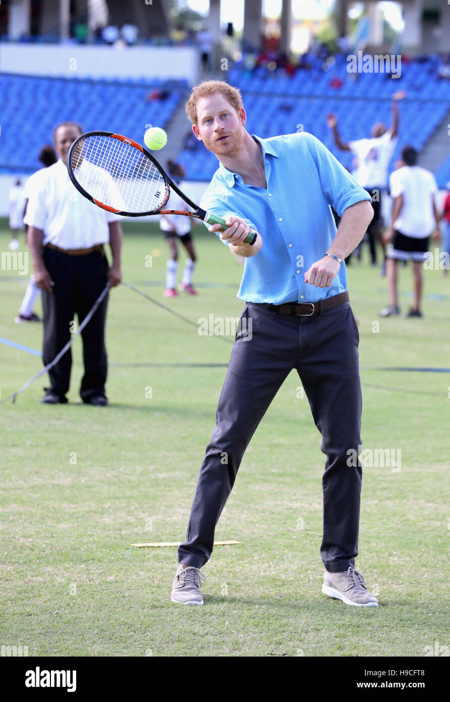 Prince Harry tennis as he attends a youth sports festival at the Sir Vivian Richards Stadium in North Sound, Antigua, on the second day of his tour of the Caribbean Stock