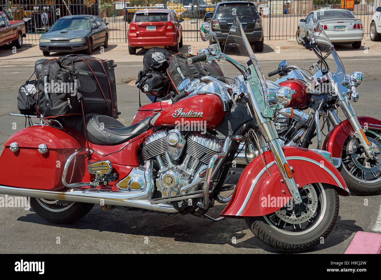 An Indian and Harley Davidson motorcycles side by side in Kingman