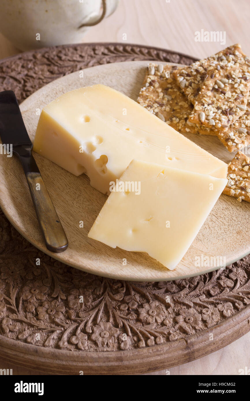 Jarlsberg a mild creamy Norwegian cheese similar to Swiss Emmental with