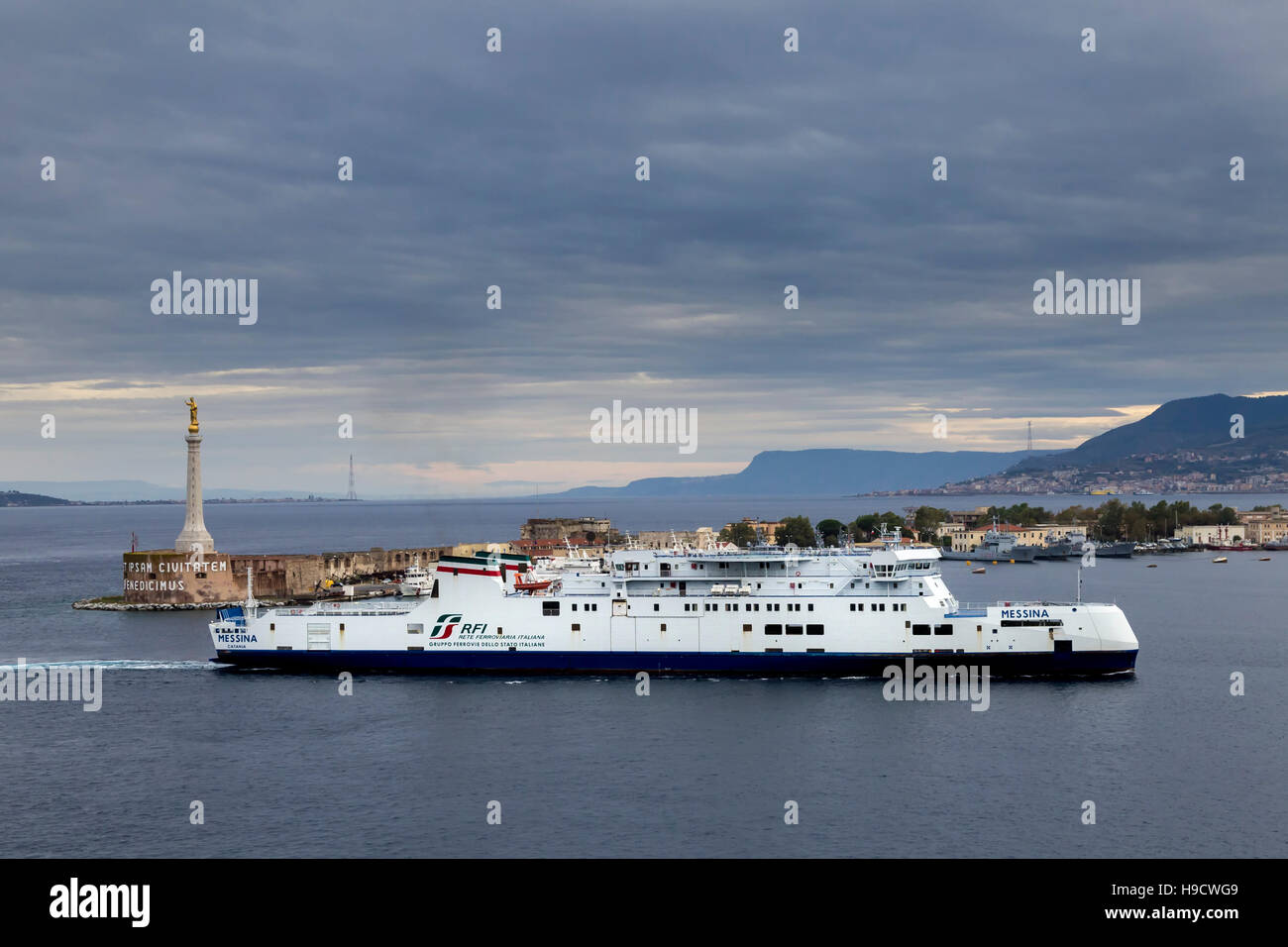 Ferry entering Messina harbour early morning, Messina, Sicily Stock
