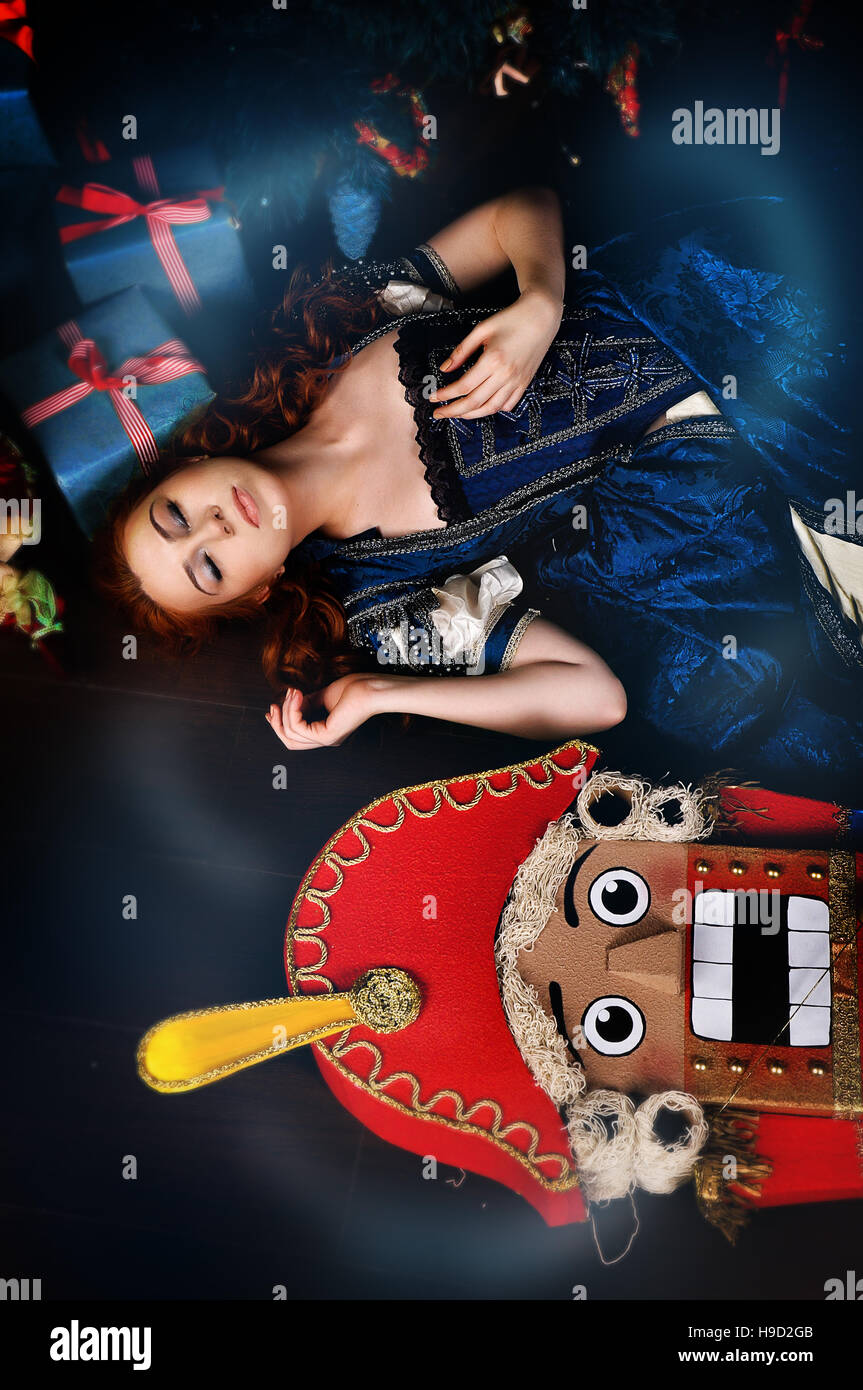 Beauty fashion woman who holding a nutcracker christmas Stock Photo Alamy