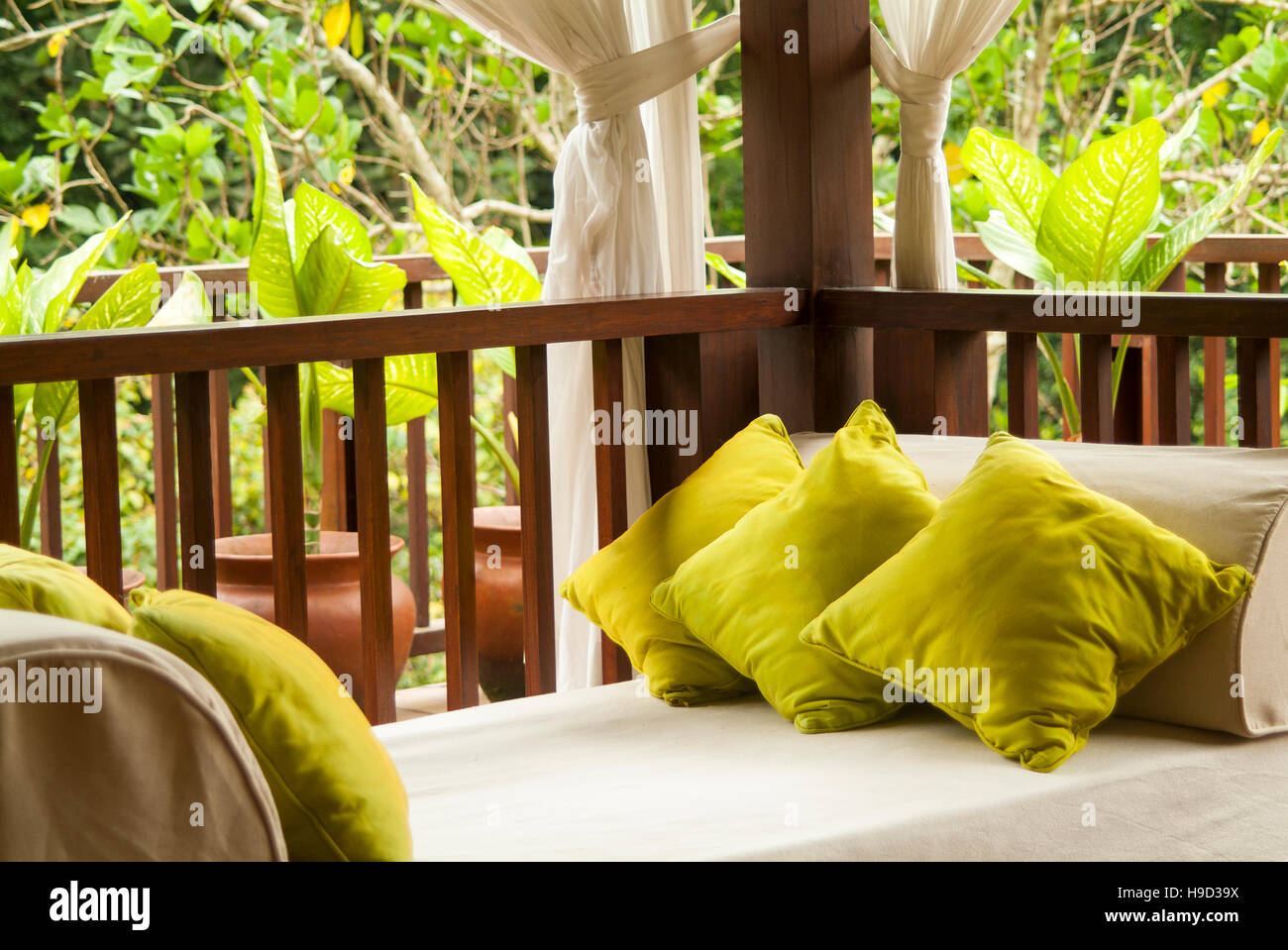 An outdoor sitting area in a hotel in Ubud, Bali. Stock Photo