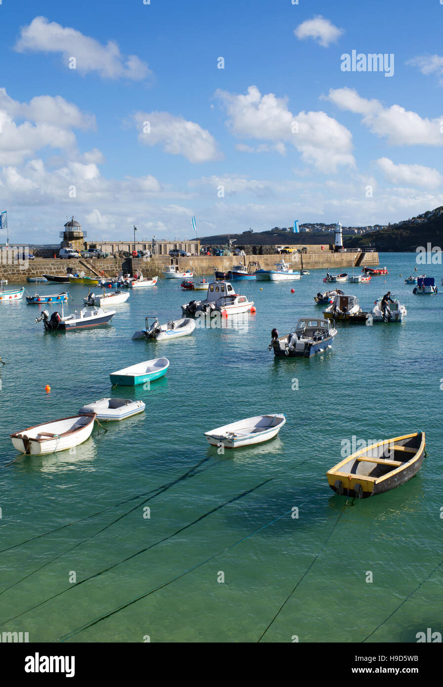St Ives harbour boats at high tide and Smeaton's pier, Cornwall England UK. Stock Photo