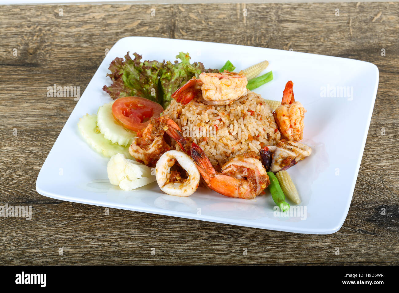 Asian style Fried rice with seafood, herbs and spices Stock Photo - Alamy