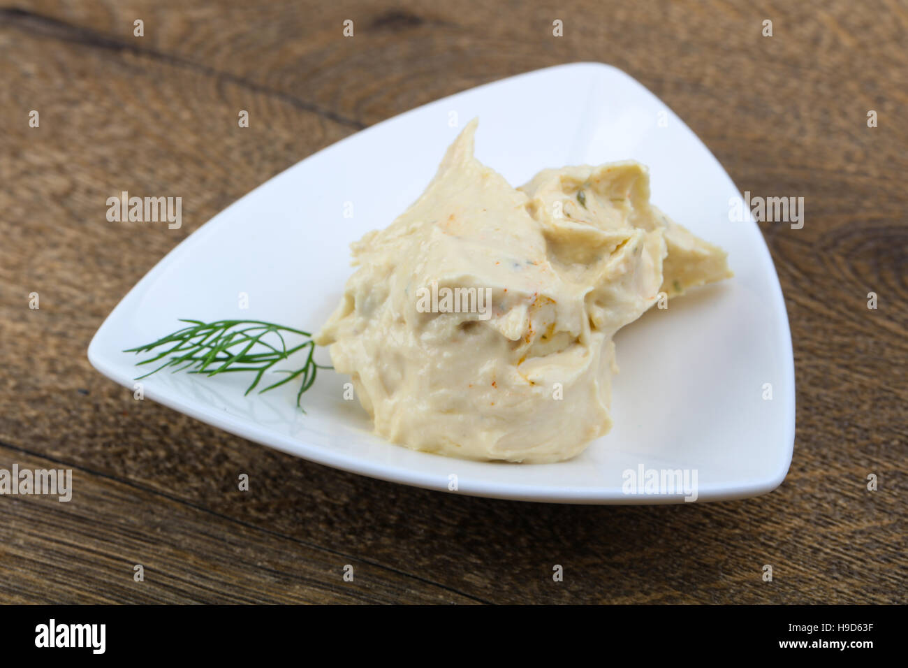 Arabic traditional cusine hummus with dill and cedar nuts Stock Photo