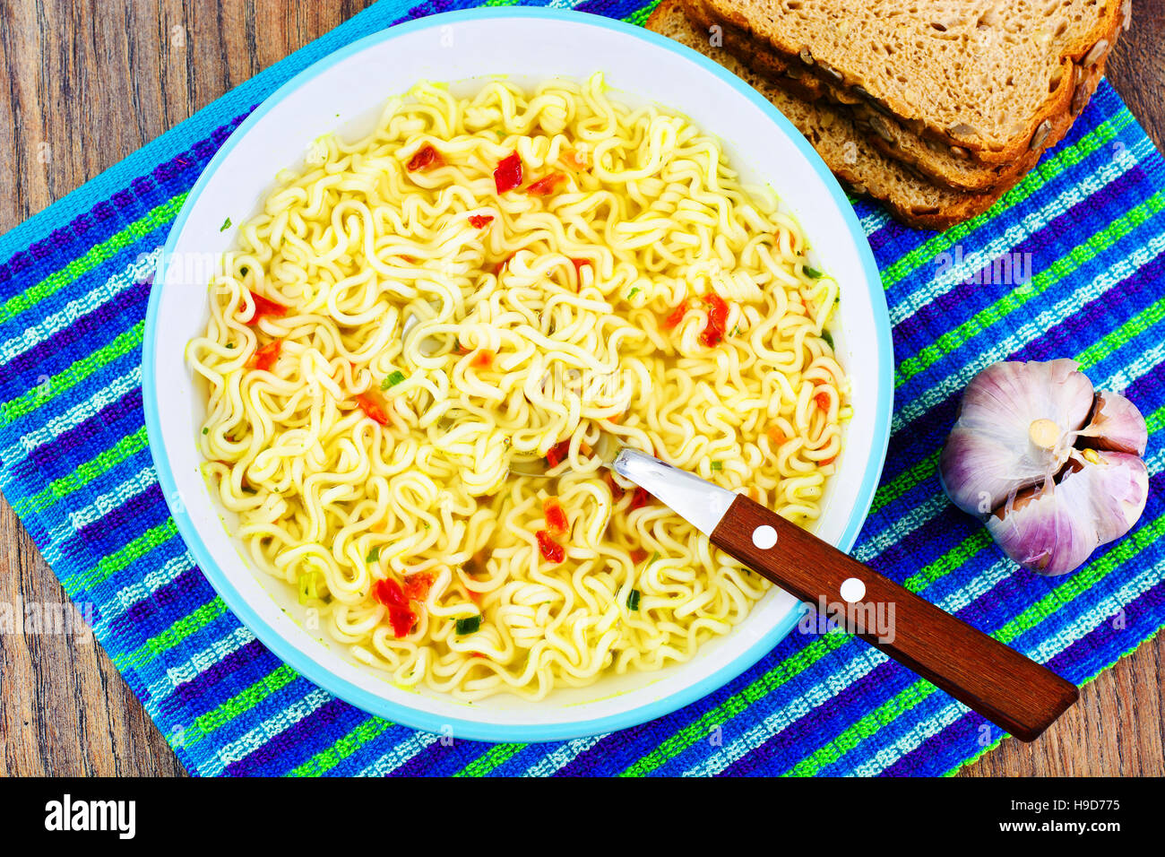 Tasty Chicken Soup with Chinese Noodles Stock Photo - Alamy