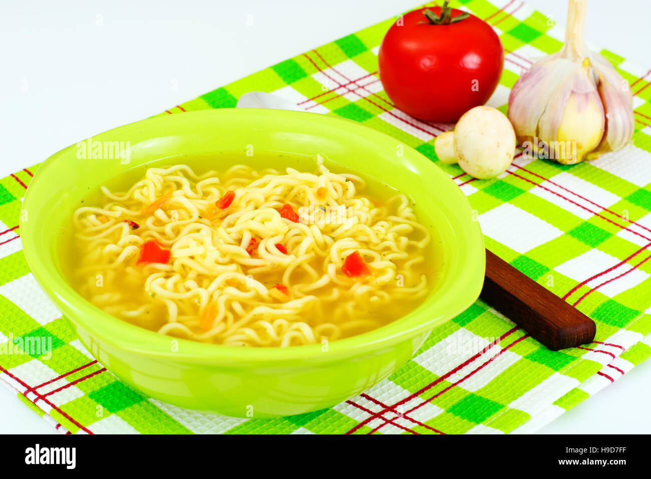 Tasty Chicken Soup with Chinese Noodles Stock Photo - Alamy