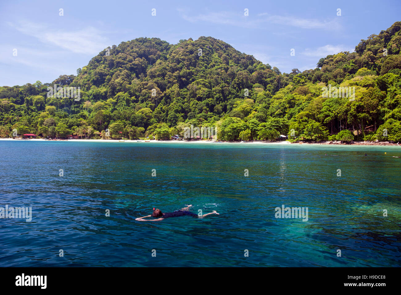 Snorkeling at Pulau Tenggol, an island off peninsular Malaysia's east coast, boasting some of the finest and most untouched beaches in Asia. Stock Photo