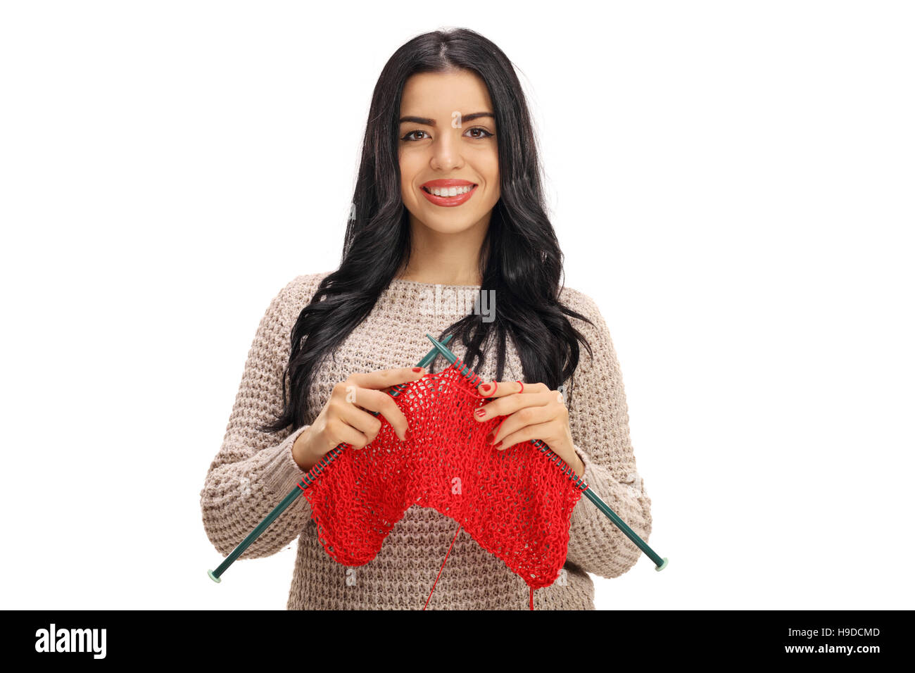Young woman knitting isolated on white background Stock Photo - Alamy