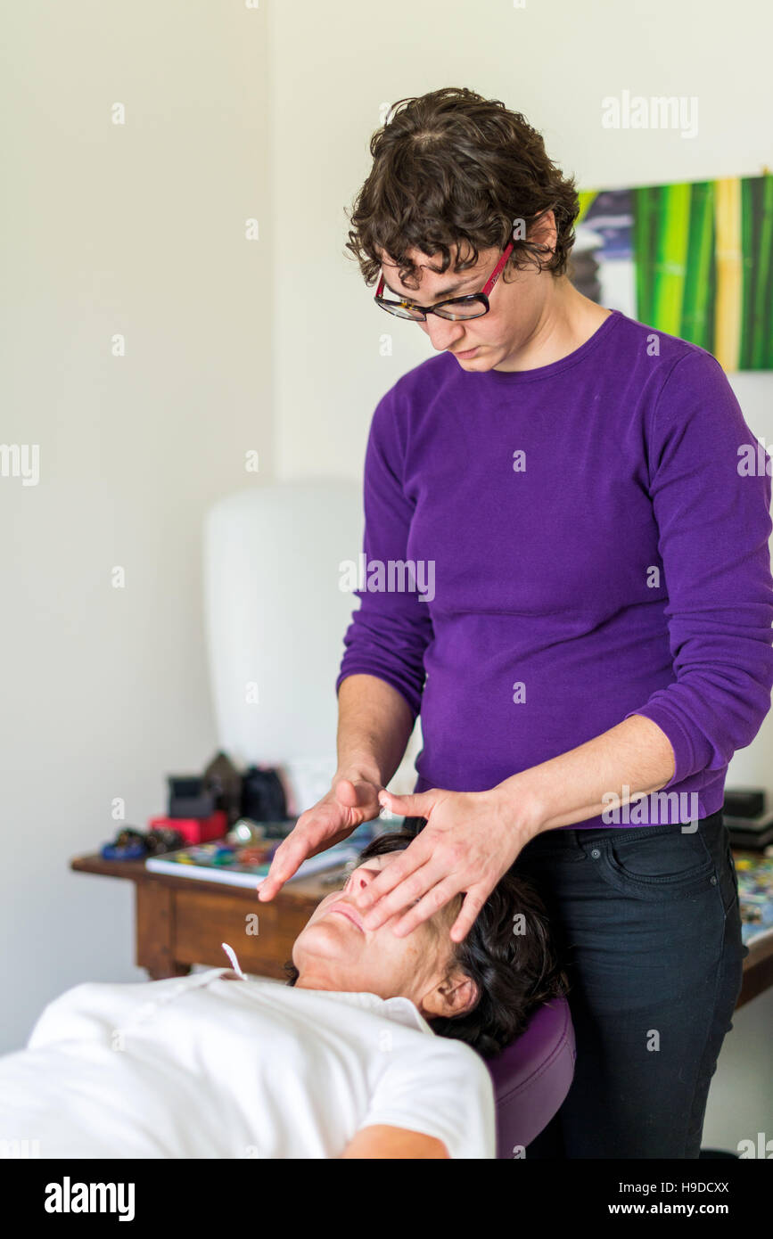 Therapeutic magnetism, healing session. Stock Photo