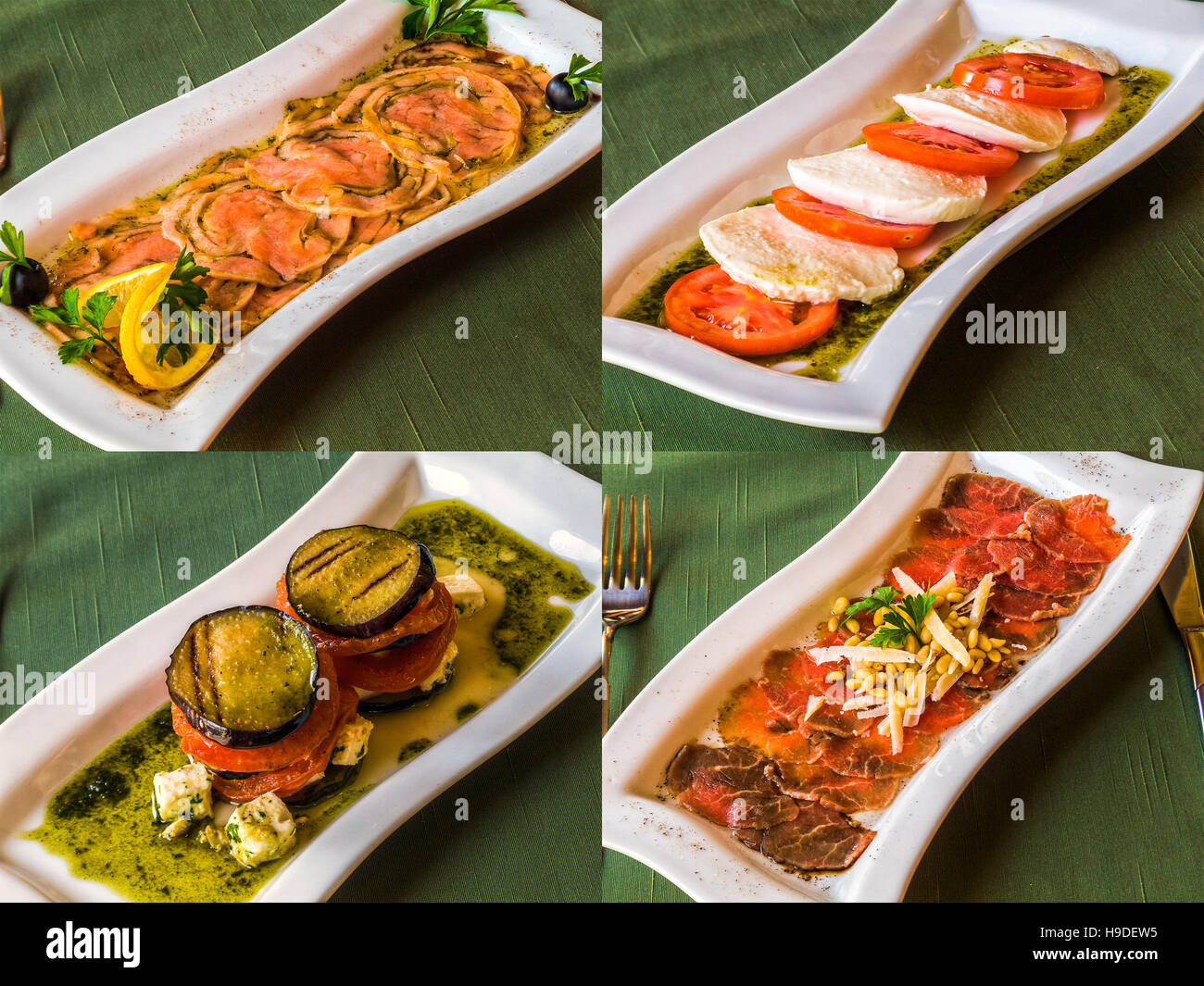 eggplant and caprese salads with carpaccio. set of dishes for celebration table Stock Photo