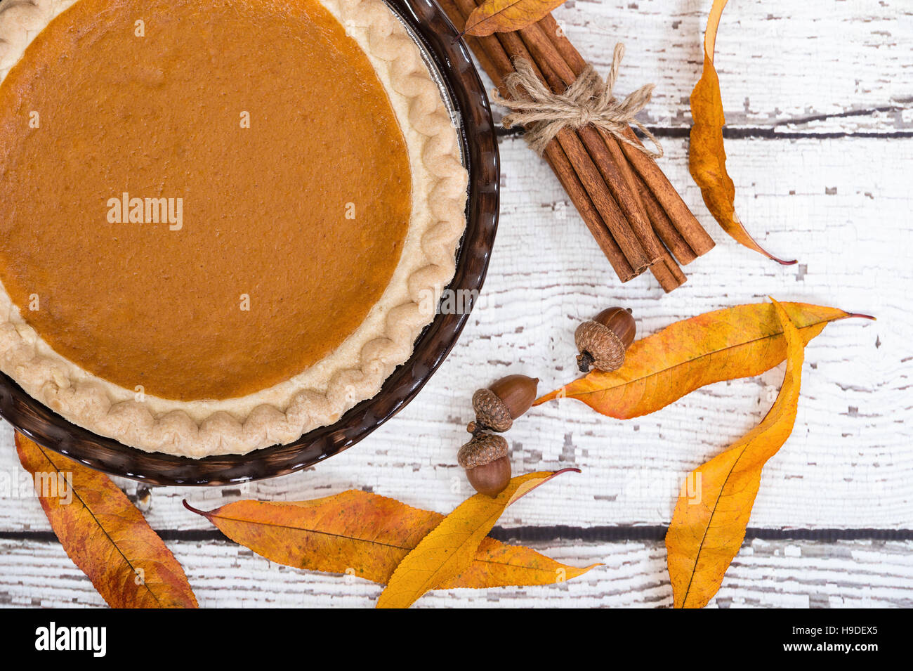 Pumpkin Pie With Autumn Decorations On Vintage Wooden Table Stock