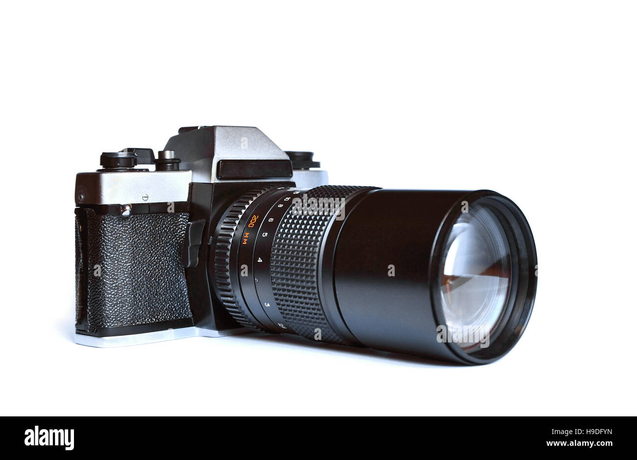 Retro film photo camera isolated on white background Stock Photo - Alamy