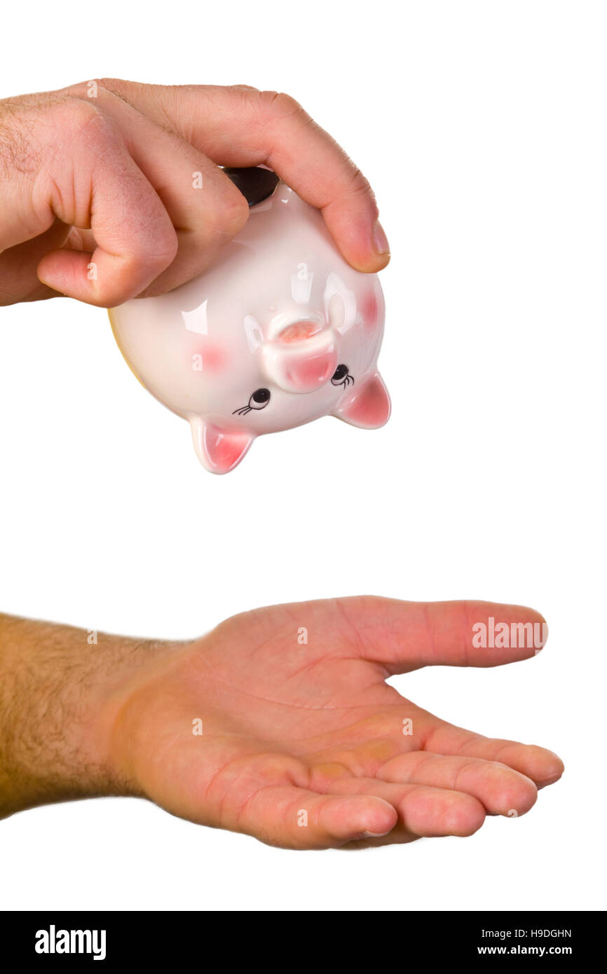 Hand hold an empty piggy bank - isolated on whithe background Stock Photo