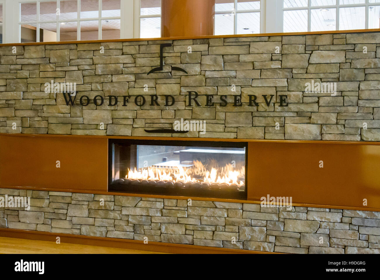 Versailles, KY, USA - October 19, 2016 :  Woodford Reserve Bourbon bottles on display inside Visitors Center., KY, USA - October 19, 2016 :  Fireplace Stock Photo
