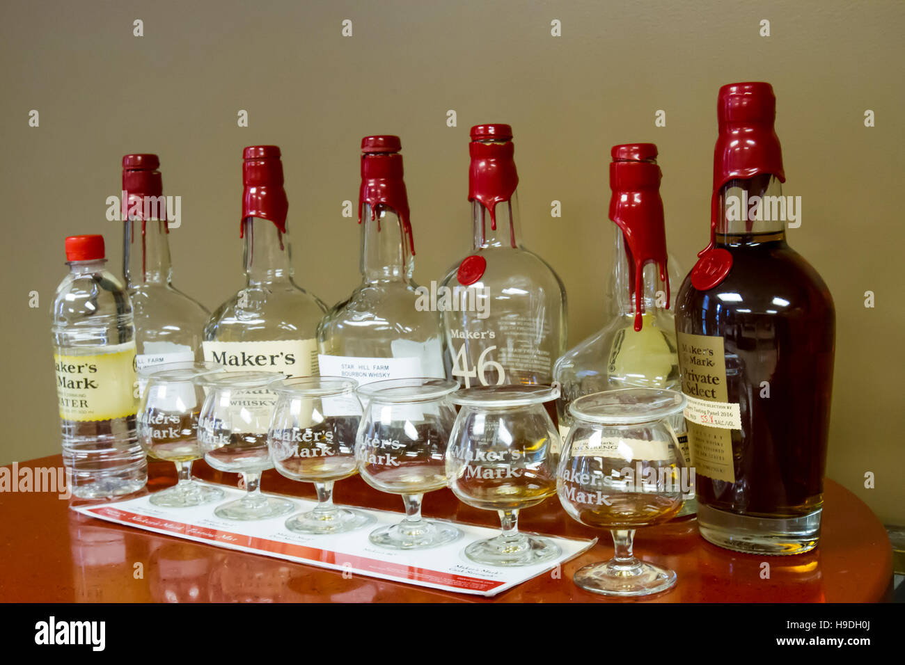 Loretto, KY, USA - October 21, 2016 :  Bottles and glasses of Maker's Mark bourbon sampled at conclusion of distillery tour. Stock Photo