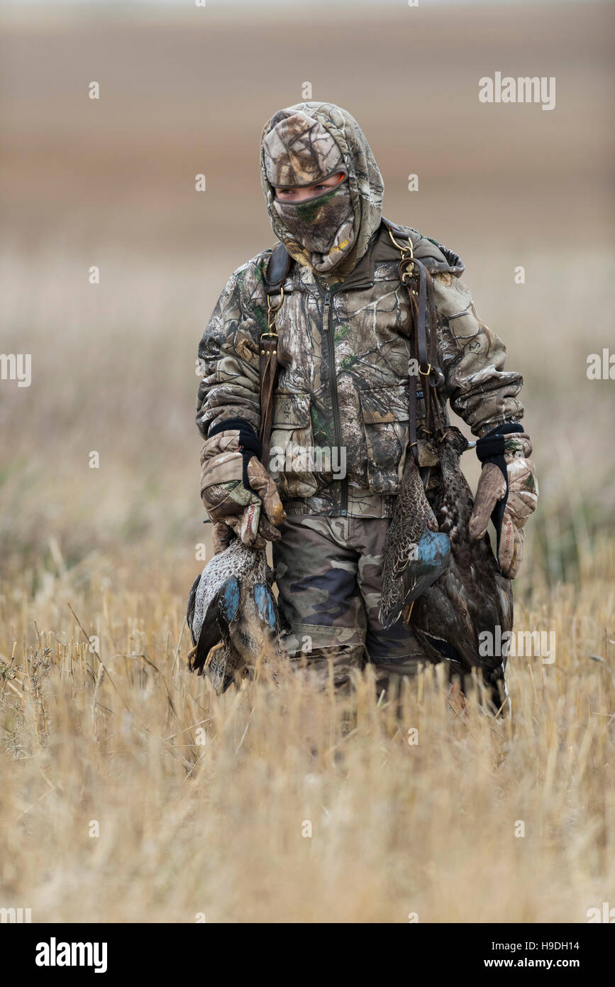 A Young duck hunter with Ducks in North Dakota Stock Photo Alamy