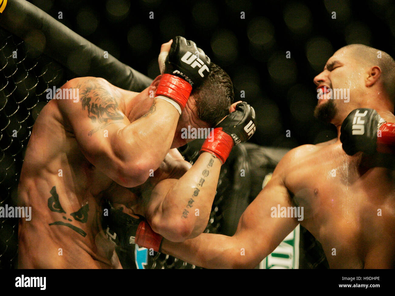 James Irvin, left, fights, Hector Ramirez during the Ultimate Fighting