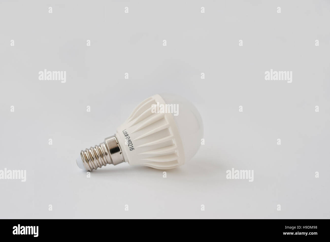 LED bulb 60 V 6 Watt E14 on white background. Stock Photo