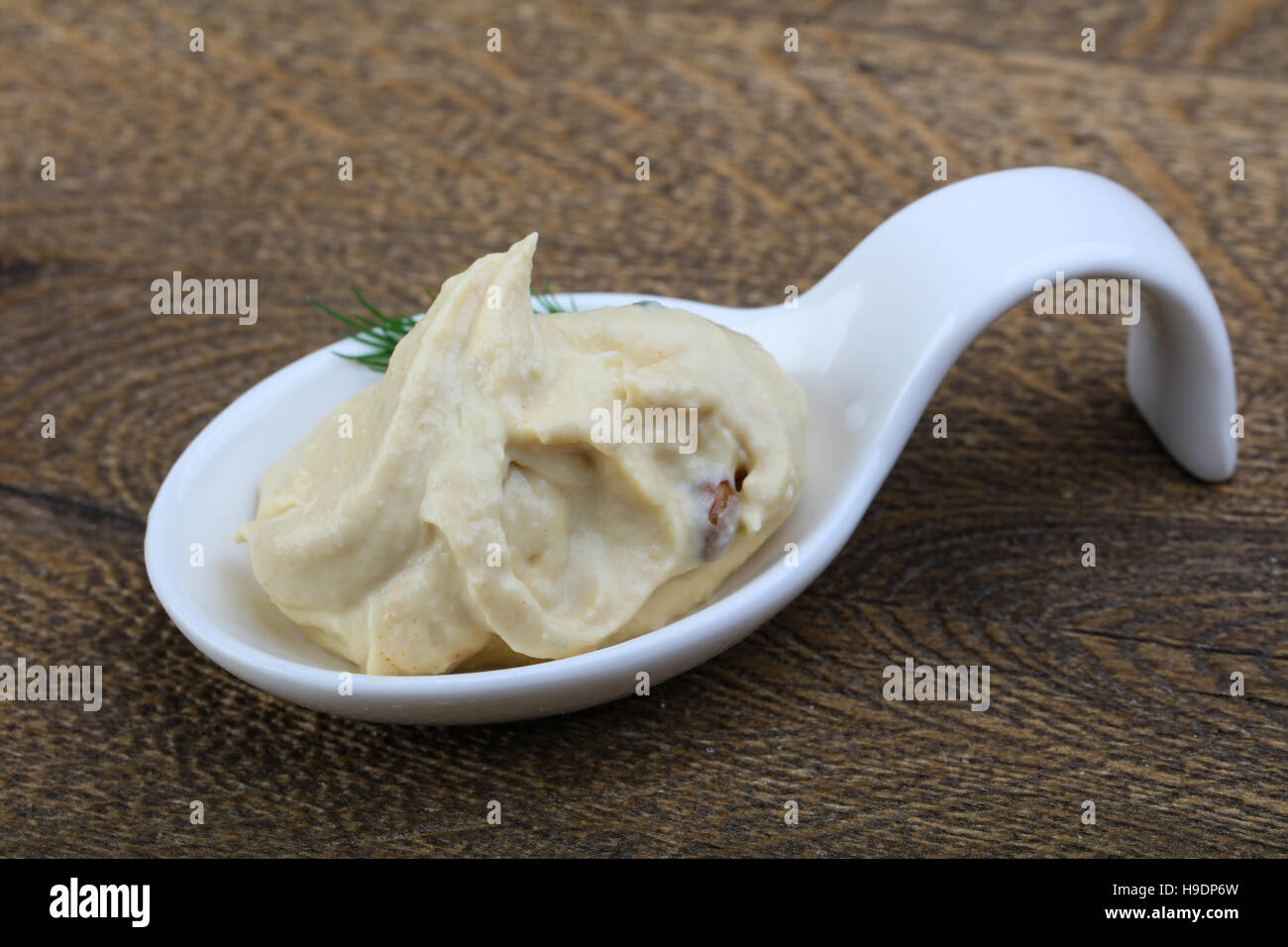 Arabic traditional cusine hummus with dill and cedar nuts Stock Photo