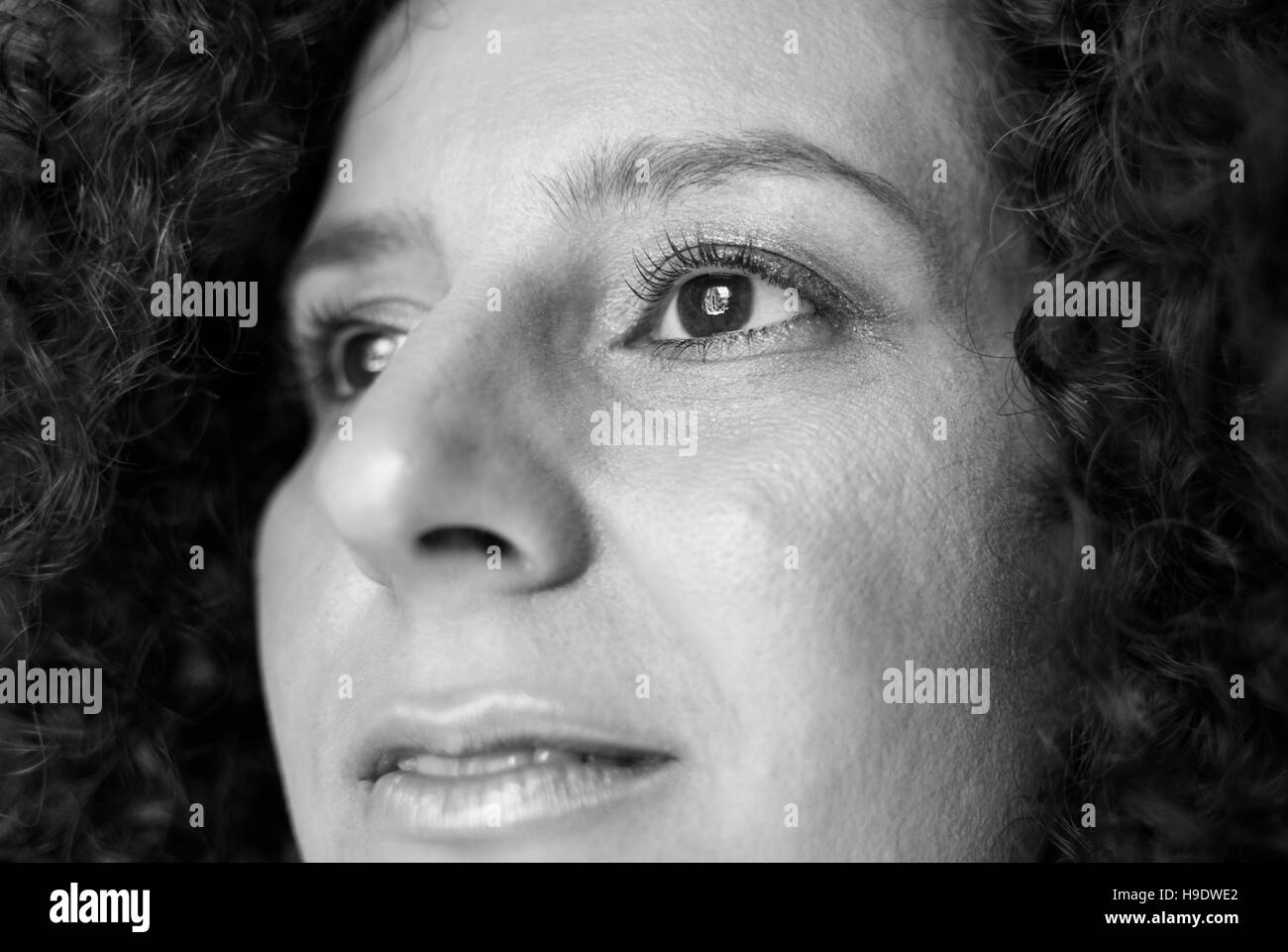 Face of a woman looking forward Stock Photo Alamy