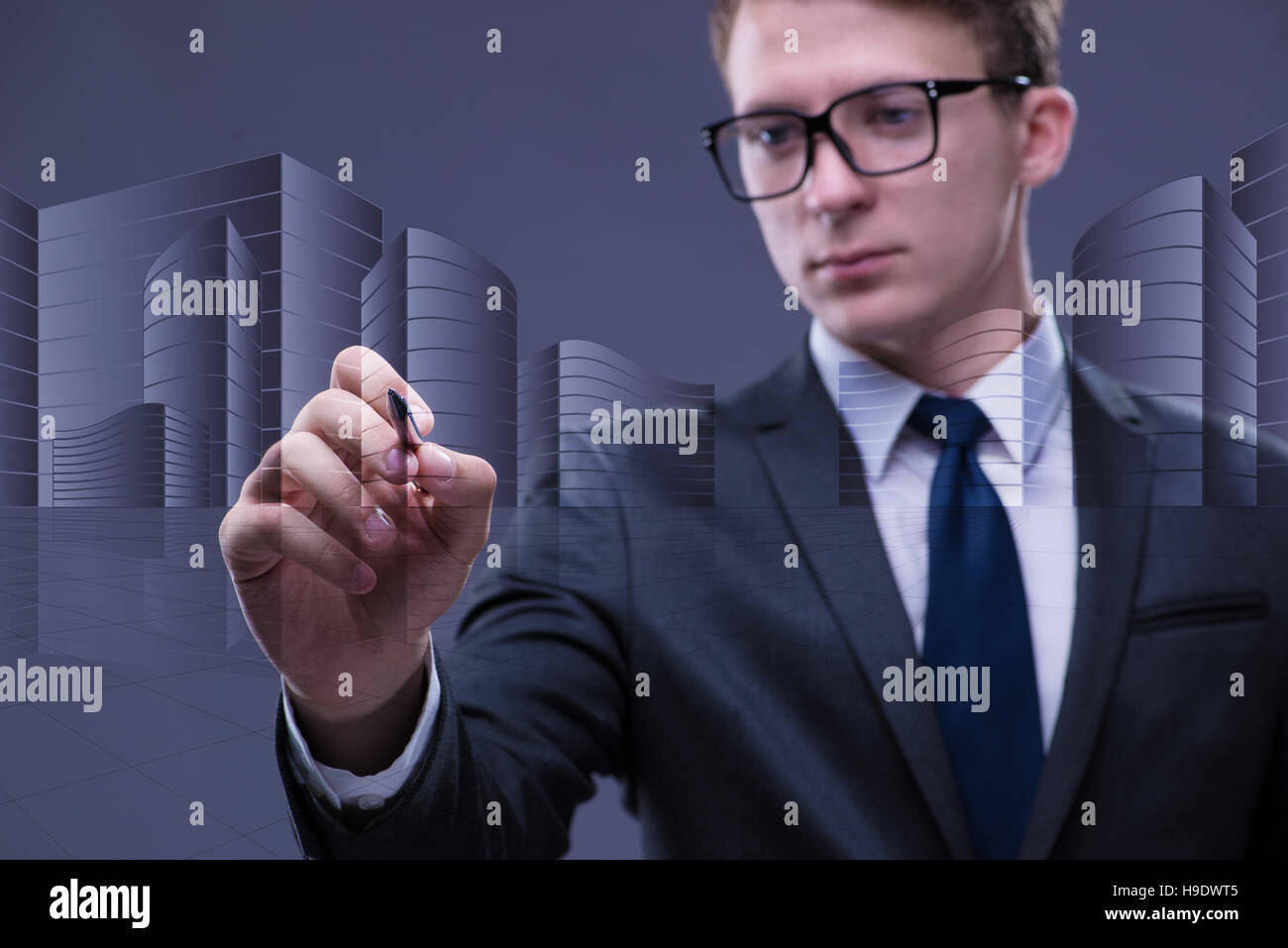 Young architect in urban planning concept Stock Photo Alamy