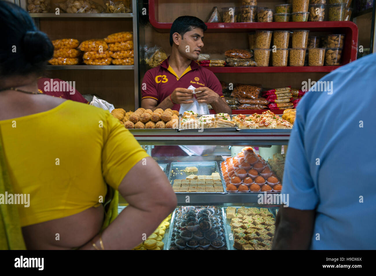 Shoppers buying sweets at Gupta Brothers in Kolkata. Stock Photo