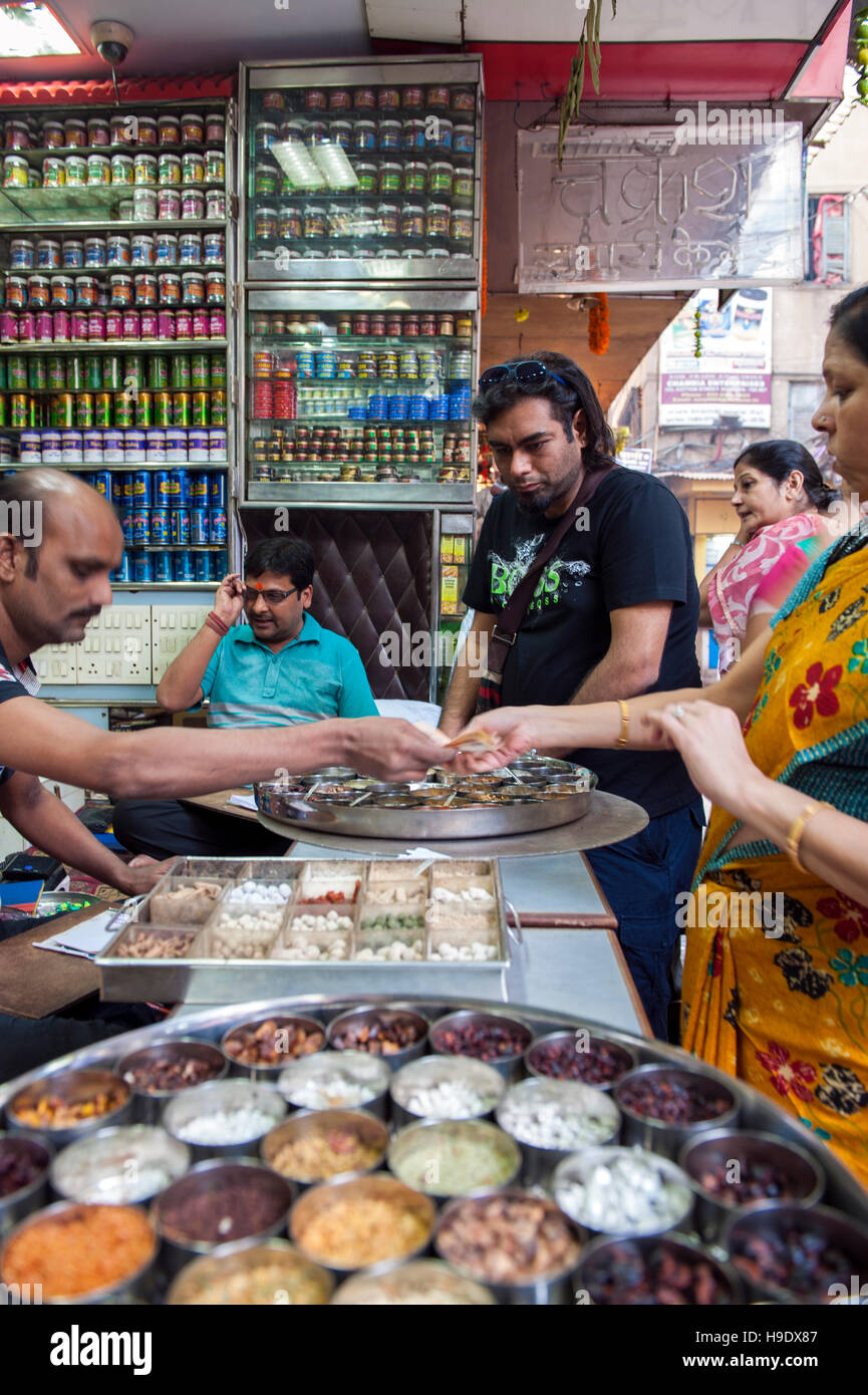 Chef Gaggan Anand buying paan at Chakresh Supari paan shop in Burra Bazar, otherwise known as Bara Bazar, and one of India's biggest wholesale markets Stock Photo