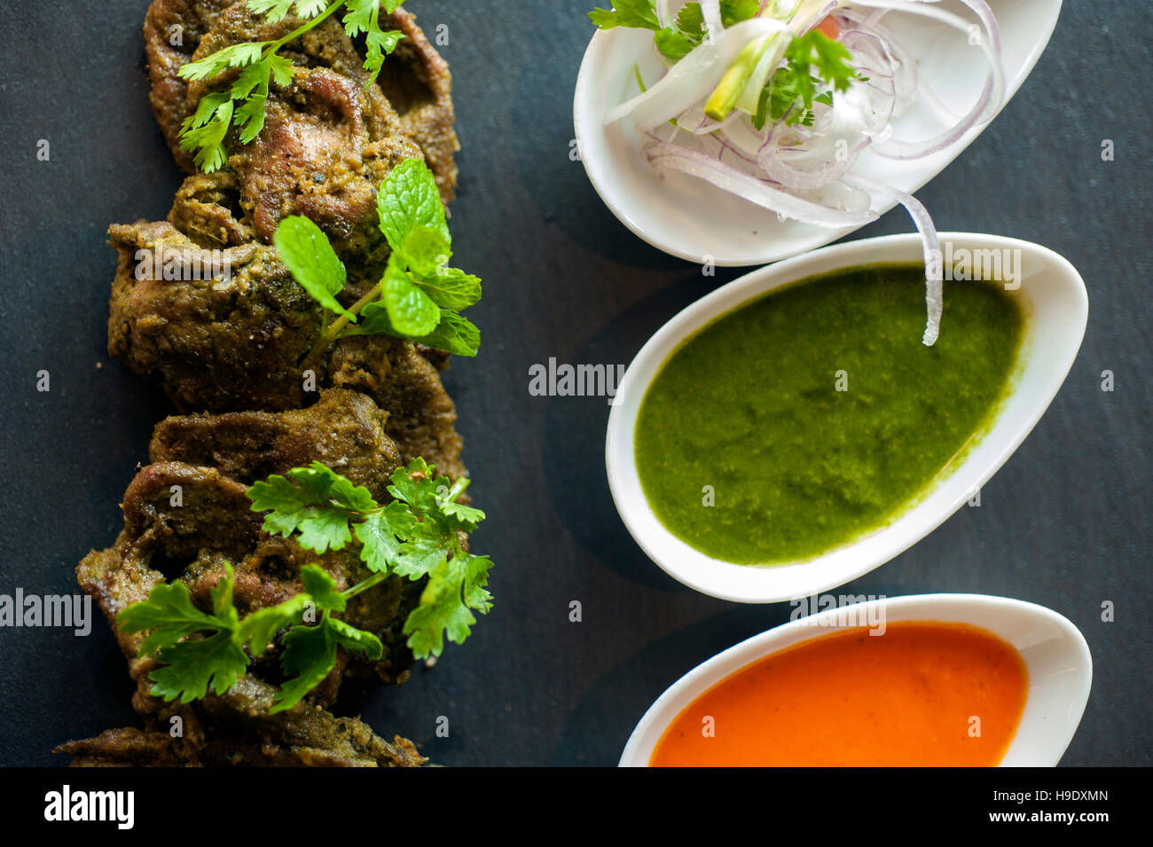 A lamb kebab at Falaknuma Palace in Hyderabad. The city's cuisine is a mix of Arabic, Mughal and Turkish known locally as Deccani. India. Stock Photo