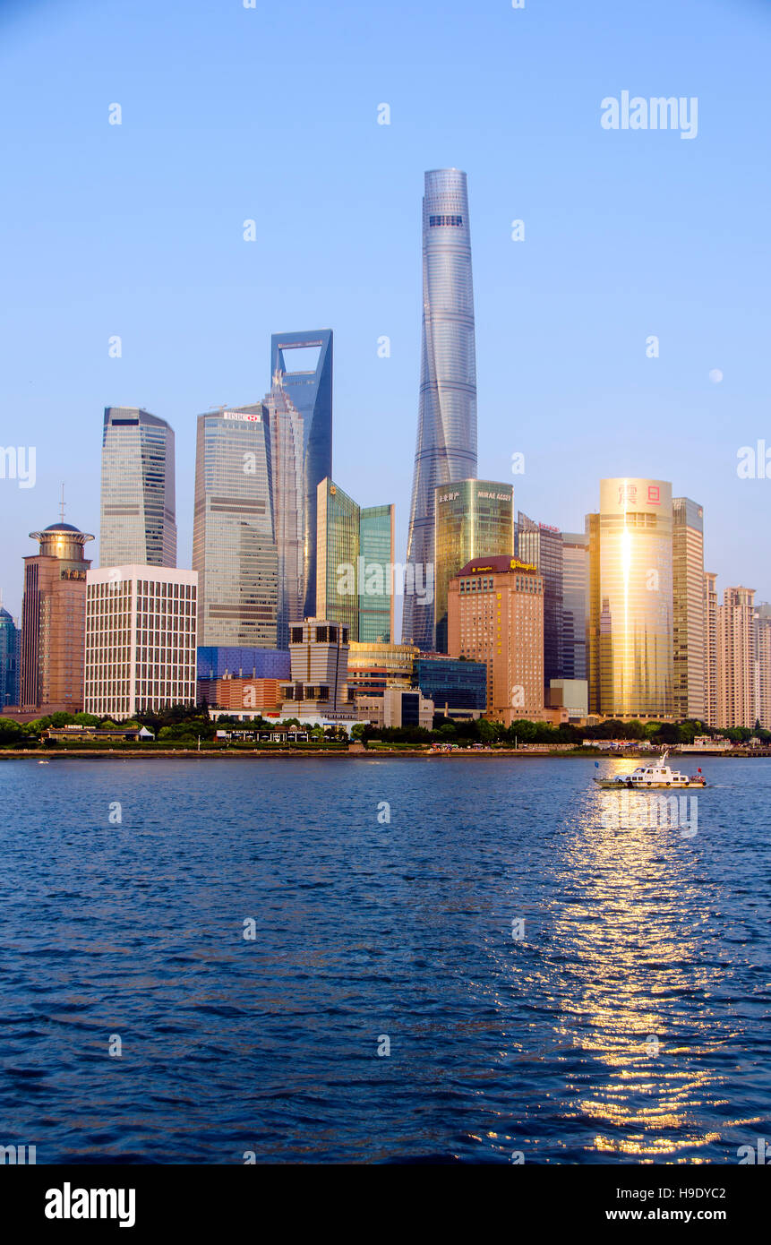 Shanghai Pudong New Skyline of Cityscape in the golden sunshine. The Tallest building is Shanghai Tower located in Pudong Stock Photo