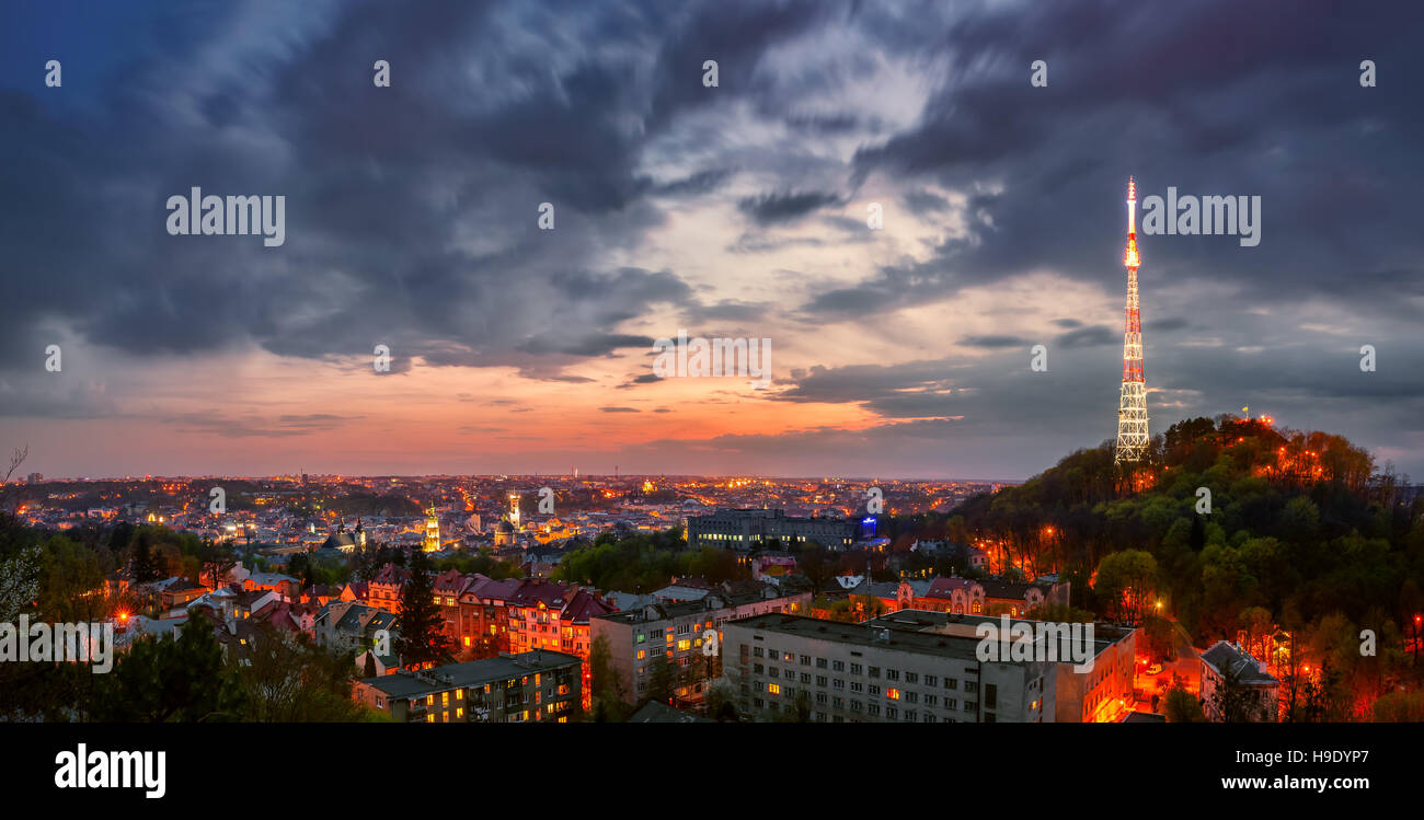 Twilight over an evening city with a backlight, night landscape, Lviv, Ukraine Stock Photo