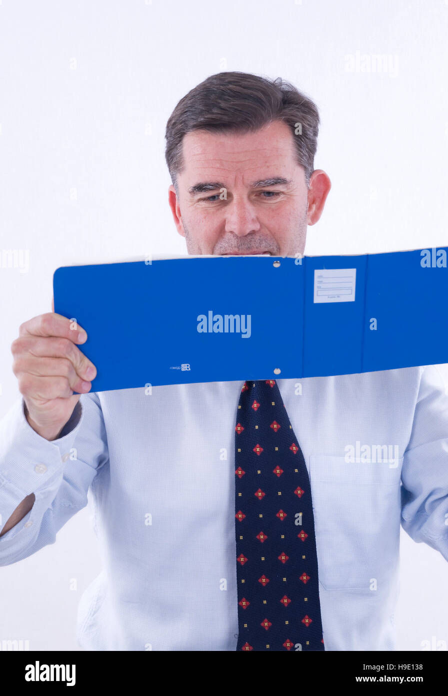 Businessman, over 50, with bank receipts Stock Photo