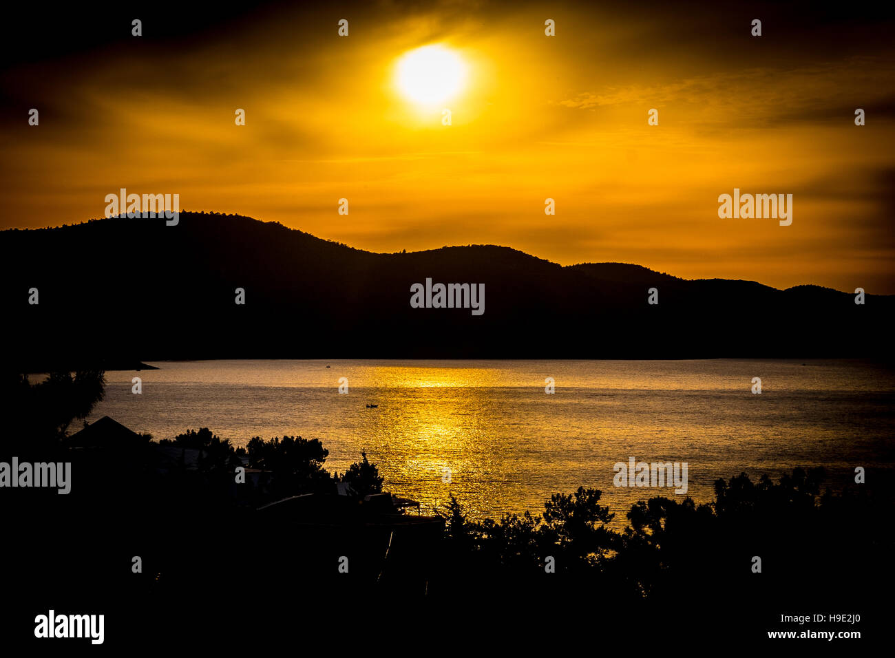 sundown, sunset, mountain, sea Stock Photo Alamy