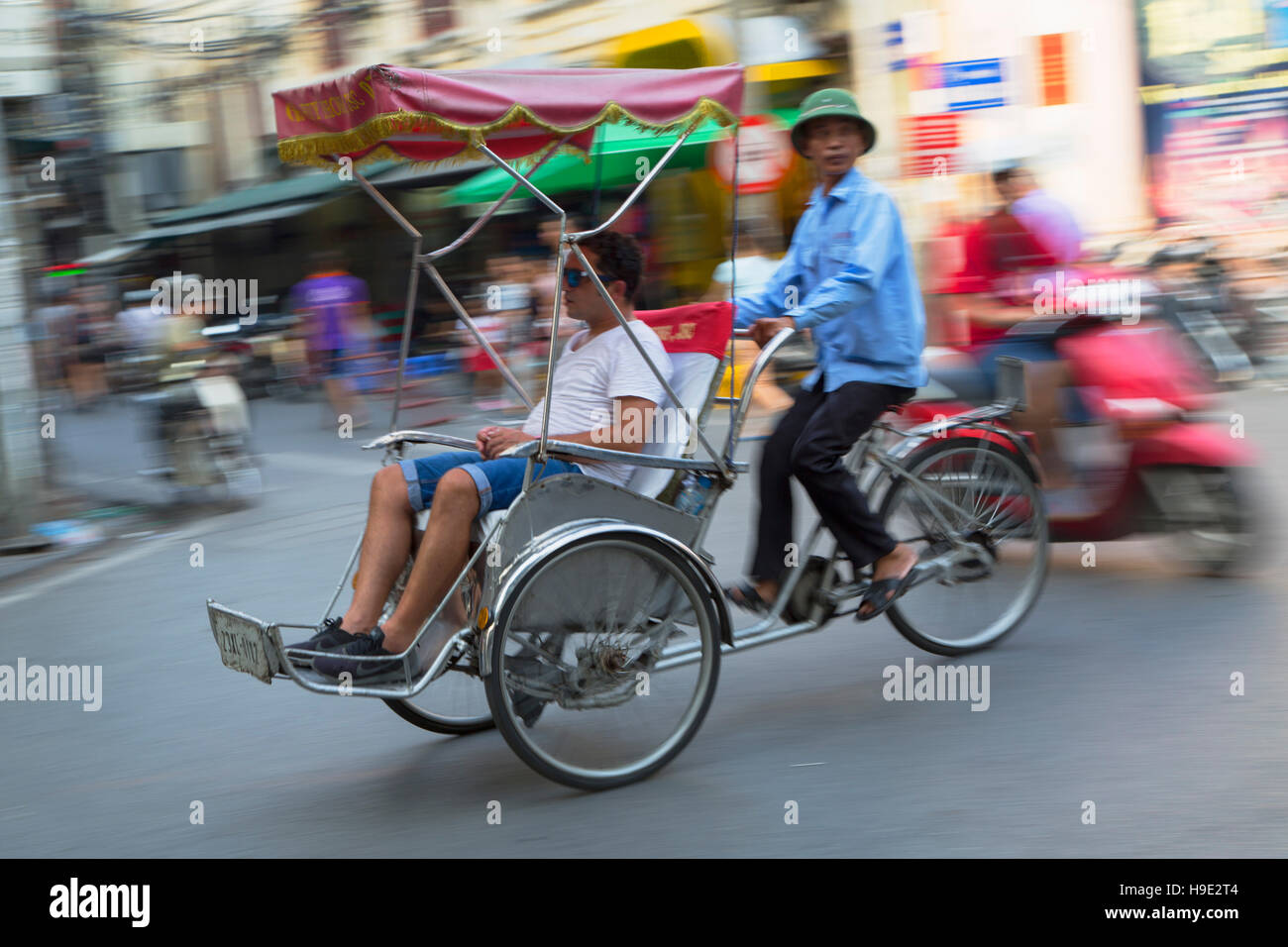 Tourist riding in tricycle rickshaw hires stock photography and images