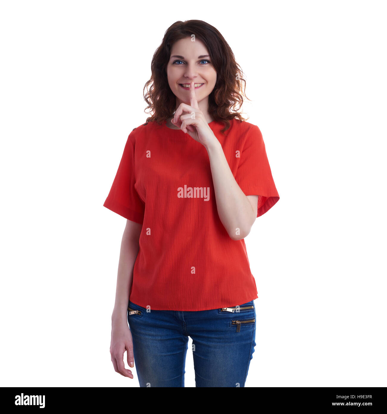 Smiling young woman over white isolated background Stock Photo - Alamy